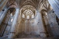 Sunbeams through the window in a medieval gothic chapel Royalty Free Stock Photo