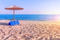 Sunbed, straw umbrella on beautiful beach Royalty Free Stock Photo