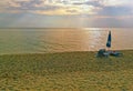 Sunbed and umbrella on the beach of the Greek mediteranean sea Royalty Free Stock Photo