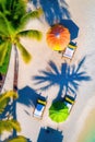 Sunbeds on the beach. Blue sea and white sand. Generative Ai Royalty Free Stock Photo