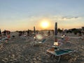 Sunbeds on the beach and sunset