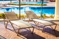 Sunbeds in the indoor swimming pool Royalty Free Stock Photo