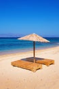 Sunbeds on Plaka beach, Naxos island Royalty Free Stock Photo