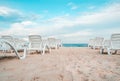 The sunbeds on the sea beach.