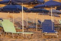 Sunbeds and sunshades in a mediterranean beach. Crete