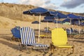 Sunbeds and sunshades in a mediterranean beach. Crete