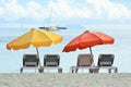 Sunbeds and sunshades in yellow and red at South Beach, Miami, Florida, USA Royalty Free Stock Photo