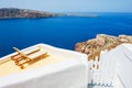 Sunbeds on the terrace of a hotel. Santorini island, Greece.