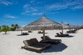 Sunbeds on the tropical beach at Maldives Royalty Free Stock Photo