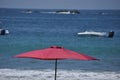 Sunbeds and umbrellas on the Adriatic coast, on a sandy beach in Italy. Rest and relaxation on holidays in a warm sunny country