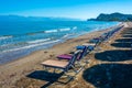 Sunbeds and umbrellas at Sidari beach at Corfu, Greece Royalty Free Stock Photo
