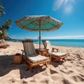 Sunbeds under an umbrella on a sandy beach by the sea. Vacation and Tourism concept