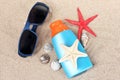 Sunblock, sunglasses, shells and starfish