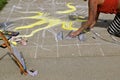 Sunburned chalk artist Royalty Free Stock Photo