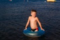 Sunburned six-year-old boy at sea Royalty Free Stock Photo