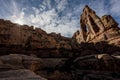 Sunburst Breaks Over Rocky Cliff At Druid Arch