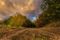 Sunburst clouds and colorful autumn Royalty Free Stock Photo