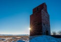 Sunburst at the historic grain elevator in Neipath, Saskatchewan, Canada