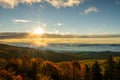 Sunburst Over Cloud Filled Valley off the Blue ridge parkway Royalty Free Stock Photo