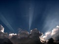 Crepuscular sunburst over clouds Royalty Free Stock Photo