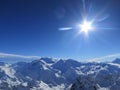 Sunburst over the Swiss Alps Royalty Free Stock Photo