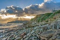 Sunburst through the clouds at Peveril Point Swanage December 