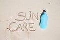 Suncare written on tropical white sand and