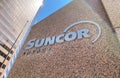 A Suncor Energy sign outside of a building in Downtown Calgary