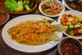 Sundanese food, spicy fried gurame fish with nut flavours, sambal shrimp paste, capcay Vegeta bles and tofu, and chicken feet Royalty Free Stock Photo