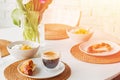 Sunday brunch at home, plate with coffee and croissant