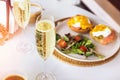 Sunday brunch with prosecco and eggs benedict Royalty Free Stock Photo