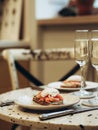 Sunday brunch with prosecco and eggs and salmon bruschetta on marble table Royalty Free Stock Photo