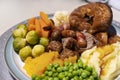 Sunday lunch, homemade roast beef with gravy, mash potato,roast potato,peas and yorkshire pudding,Traditional British dinner, Royalty Free Stock Photo