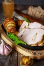 Sunday roasted pork tenderloin, juicy and succulent oven-baked piece of meat rubbed with mustard and spices: rosemary Royalty Free Stock Photo