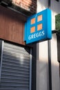 Exterior shot of Greggs Bakers signage on the front of shop