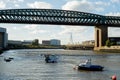 Sunderland UK: Oct 2022: The Queen Alexandra Bridge at the River Wear in Sunderland on a sunny autumn day, with fishing boats