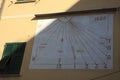 A sundial in the fishing village of Camogli, Gulf of Paradise, Portofino National Park, Genova, Liguria, Italy