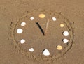 Sundial Made with Seashells on Beach, Close Up