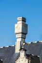 Sundial on the roof of an medieval house Royalty Free Stock Photo