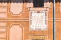 sundial on an old wall where it is written in Catalan - 1790 road 1998