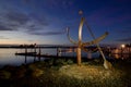Sundial at sunset on the waterfront Royalty Free Stock Photo