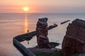 Sundown on Helgoland Lange Anna and calm sea Royalty Free Stock Photo