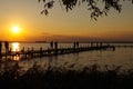 Sundown in the lake with people Royalty Free Stock Photo