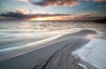 Sundown during low tide on Ijsselmeer lake