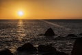 Sundown over the Altantic Ocean at Madeira coastline Royalty Free Stock Photo