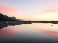 Sundown over Pacific Ocean bay at Gold Bluffs Beach, Prairie Creek Redwoods State Park