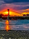 Sundown over the riverside of the river Rhein in Cologne at the Sandy beach shore Royalty Free Stock Photo