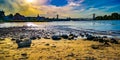 Sundown over the riverside of the river Rhein in Cologne at the Sandy beach shore Royalty Free Stock Photo