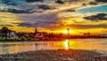 Sundown over the riverside of the river Rhein in Cologne at the Sandy beach shore Royalty Free Stock Photo