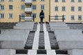 Sundsvall, Vastnorrland County -Woman walking up the stairs in old town